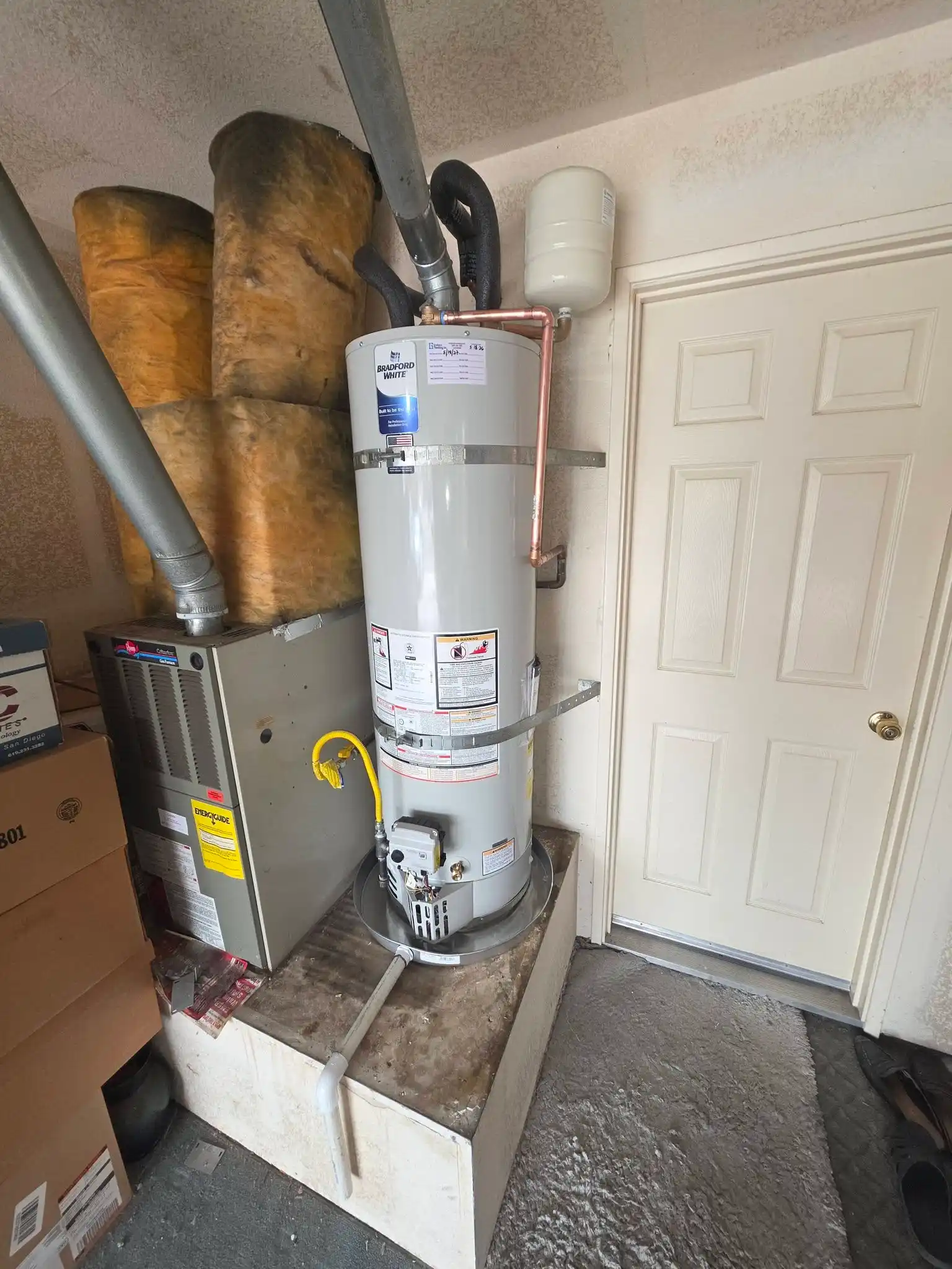 Gas water heater installed in a Chula Vista garage